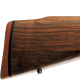 Luxusn guovnica s pabou vysokej kvality orechovho dreva a pecilnou povrchovou pravou kovu.